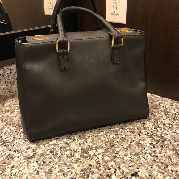 Henri Bendel West 57th Turn Lock - Picture 2 of 8